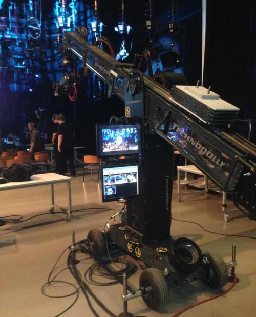 This is a robot camera crane / dolly, and one of the teams designed a lightsaber training game for it.